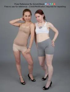Two thin female models one white, one Asian, standing shoulder to shoulder playfully cute wearing heels