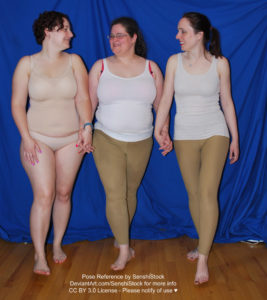 A group of various sized white women are joined together hand in hand as they're in a line and walking, each looking at each other.