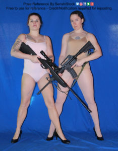 Two thin white women wearing leotards and black high heels are standing side by side, each holding a rifle.