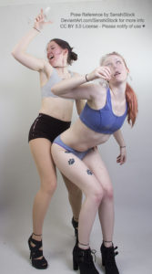 Two thin, white, female models wearing sports bras and short shorts with black high heels, are drunk dancing, margarita glasses in hand. One is leaned over guzzling down her drink, the other is grinding up behind her.