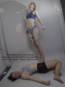 Two thin, white, female models wearing sports bras and short shorts. One is lying down on the floor, collapsed, as if she's dead. The other appears to be floating with her limbs down straight, chin up, and eyes closed.