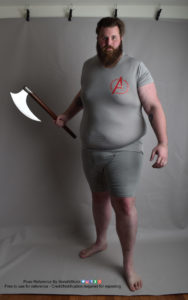 A fat white model wearing skin tight clothing is standing, legs apart, while holding an axe slightly raised, other arm relaxed, as he's staring you down.