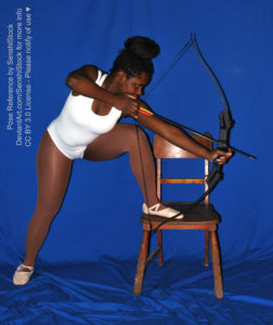 Thin black woman wearing a white one piece skin-tight bodysuit is standing with one leg straight down, the other is up on a chair, wearing pointe shoes, as she's leaning over while holding up a bow and arrow, string pulled back and ready to fire.