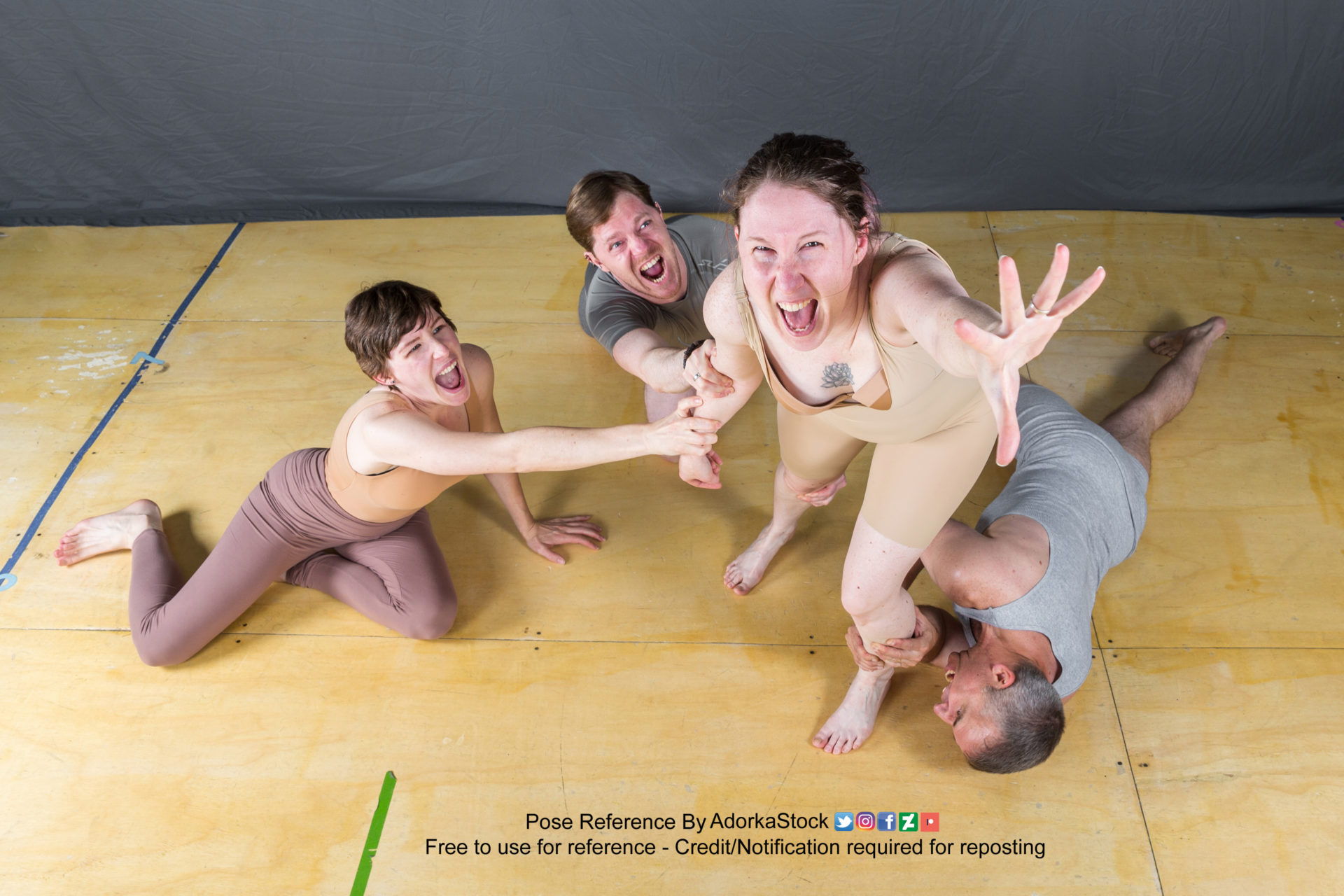 Group pose reference of four people, three on the floor holding onto or biting the fourth who is trying to pull away from them and reaching up towards the camera high above with a hand outstretched and panicked expression.