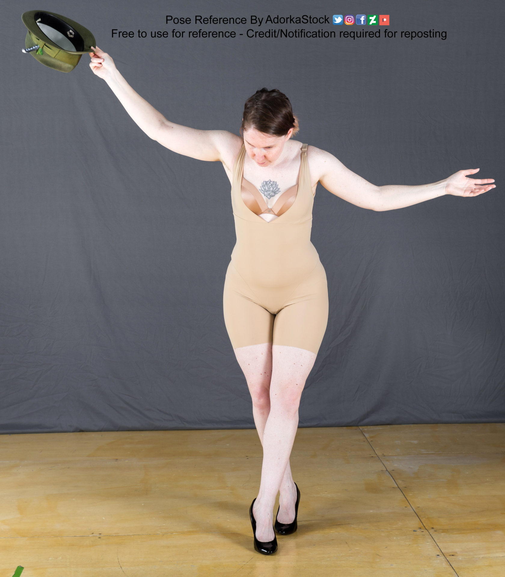 Pose reference of a thin, white, female model wearing high heels and form fitting clothing, bowing slighting from the upper body with right arm uplifted holding a hat and left arm out with an open gesture