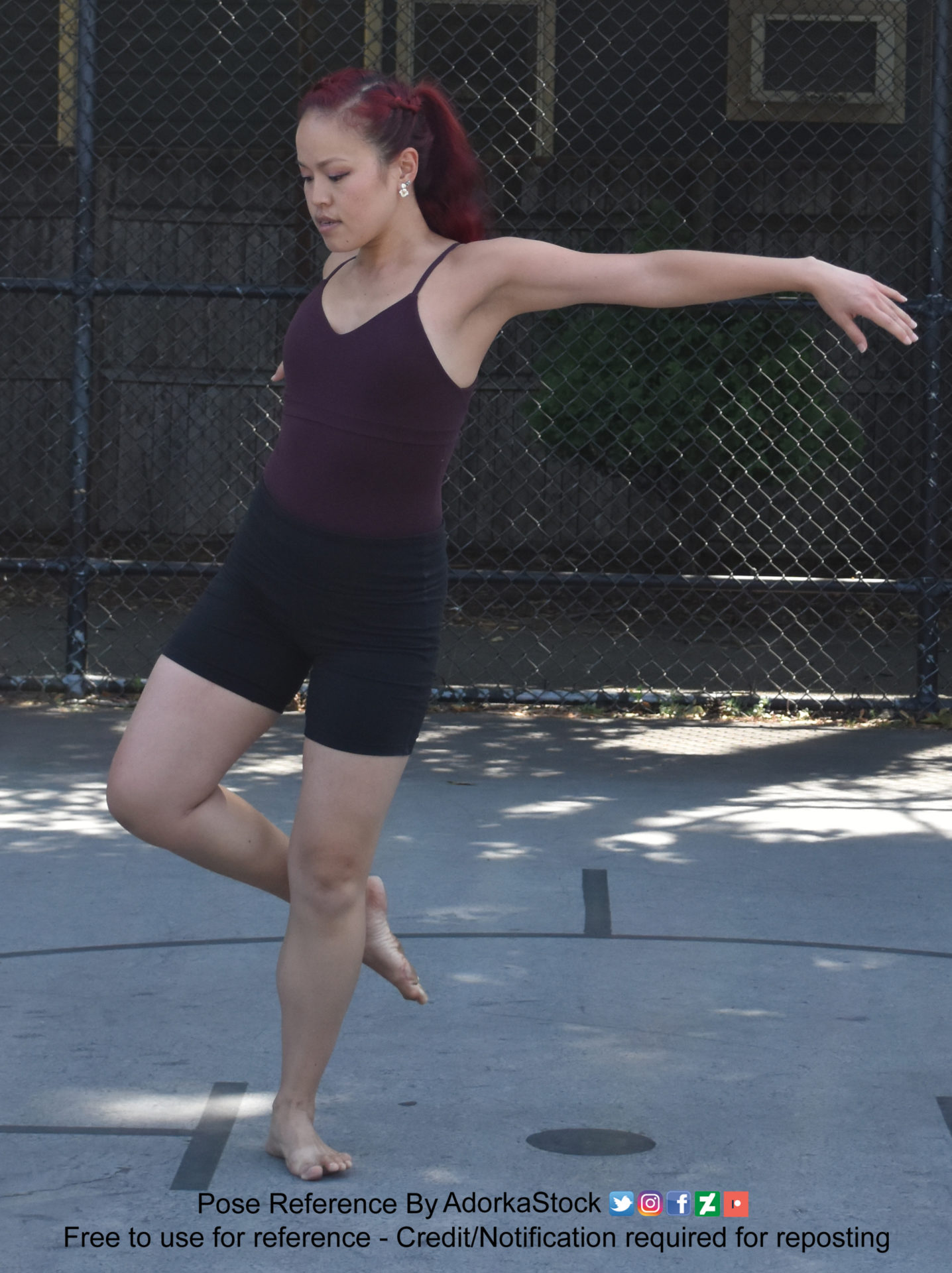 Pose reference of a thin, Asian, female model in a dancer pose on one foot with am arm extended