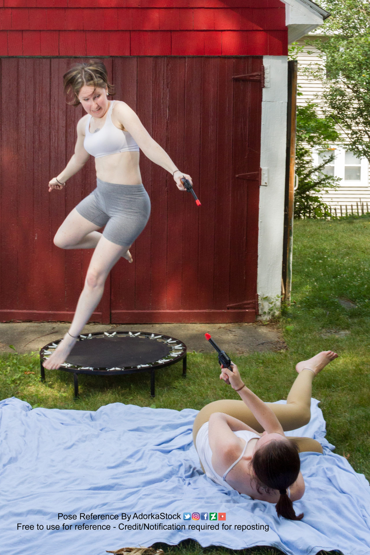 Pose reference photo of two white, female, fit models in form fitting clothing - one is jumping while holding a handgun and the other is rolling across the ground also with a hand gun as if they're in a firefight