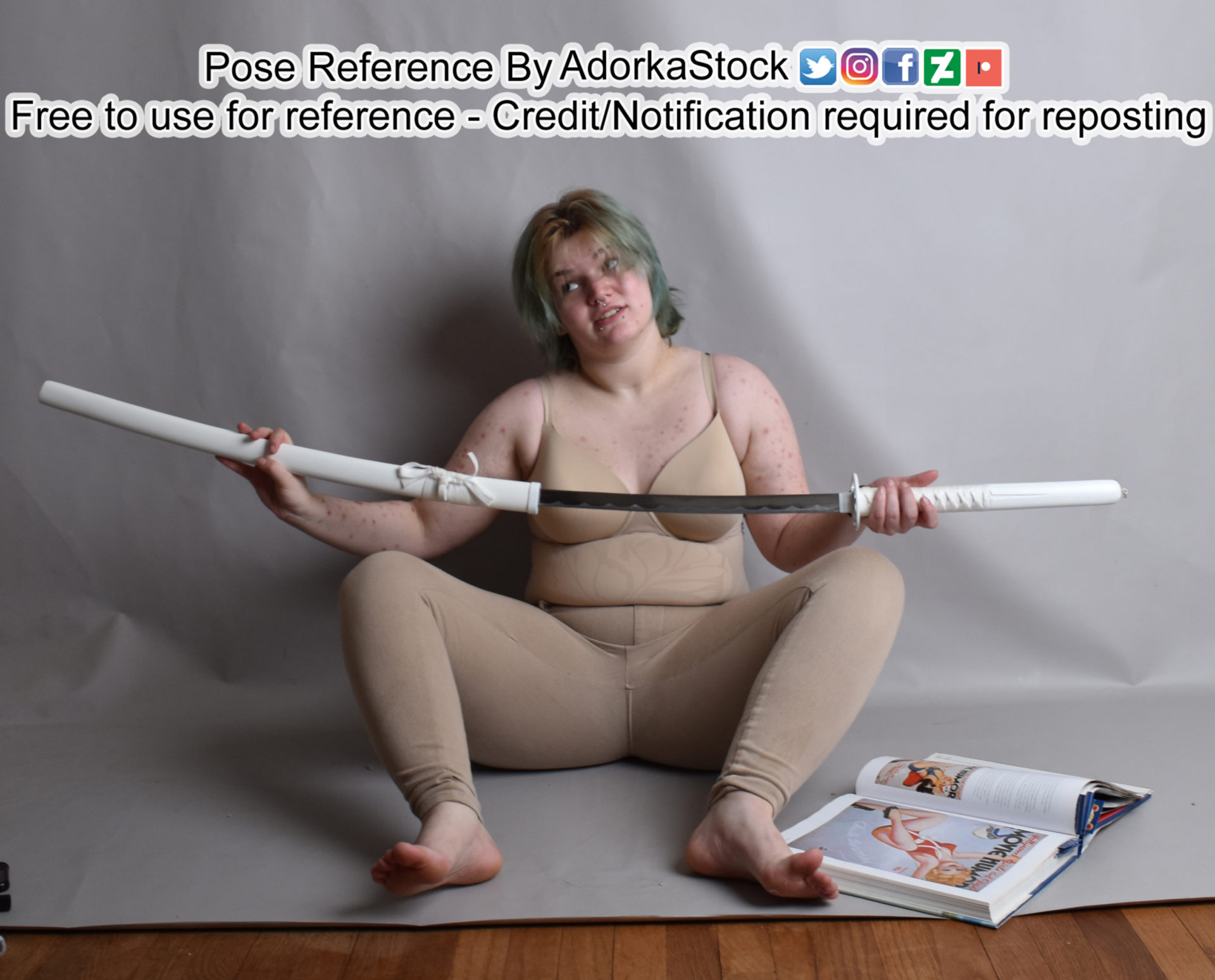 Pose reference model sitting on the floor unsheathing a katana looking suspicious