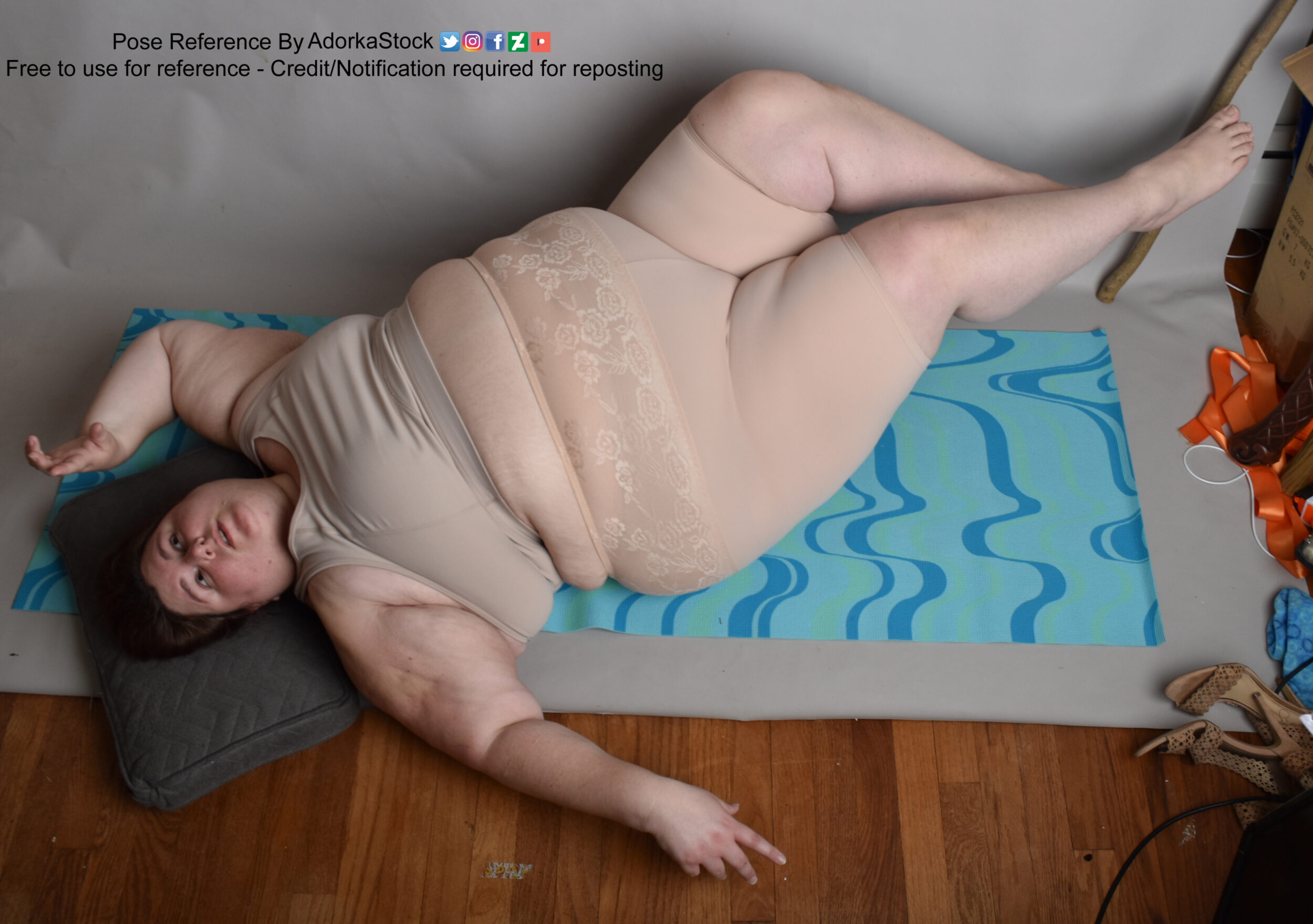 Laying graceful gesture fat model pose reference