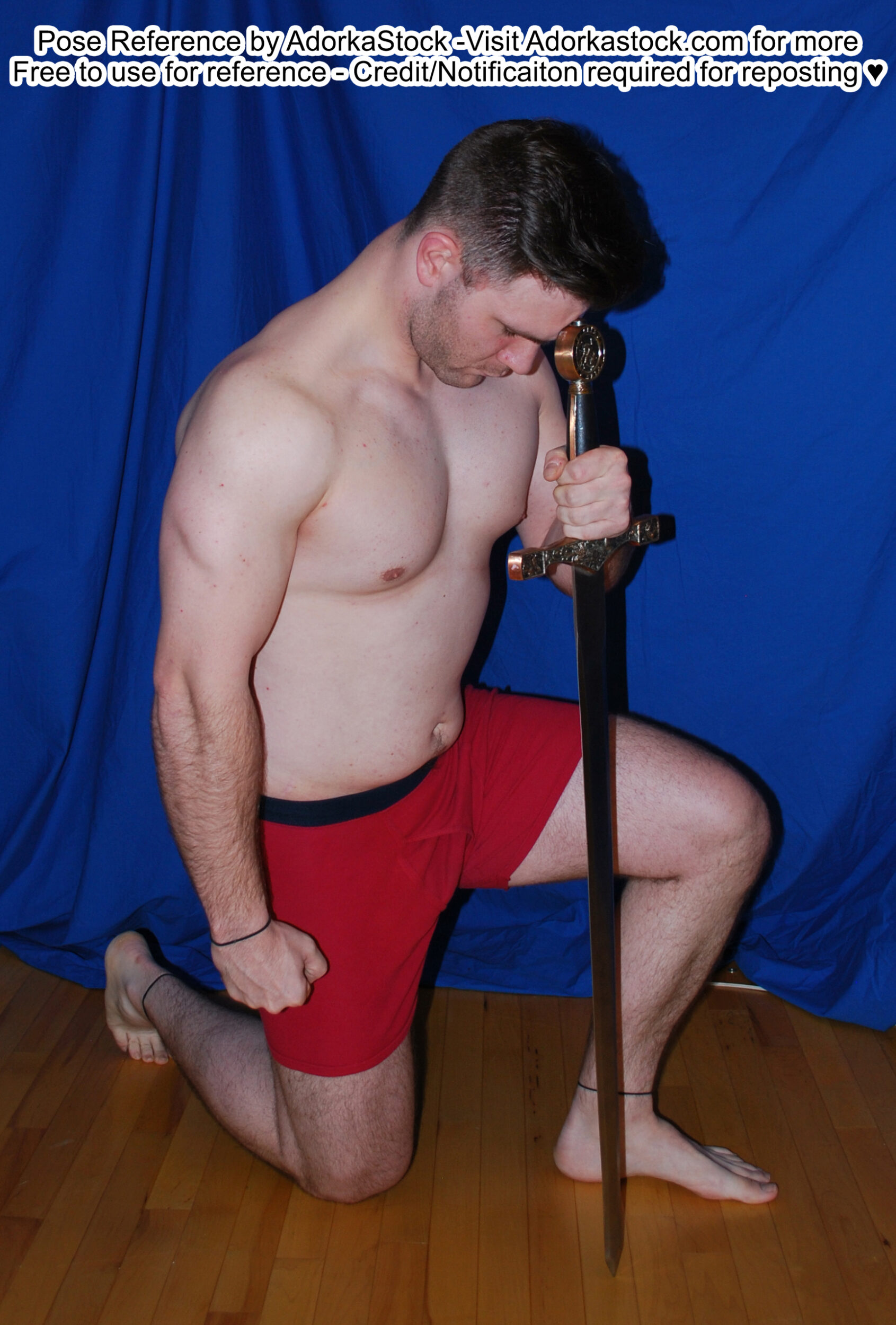 Fit, white, male pose reference model in kneeling pose with one knee up, hand on the hilt of a sword which his forehead rests on.