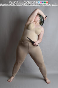 nonbinary pose reference model in action pose with two small blades