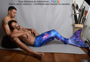 Two thin, Latino, male pose reference models in sitting/reclining pose with one model wearing a mermaid tail.