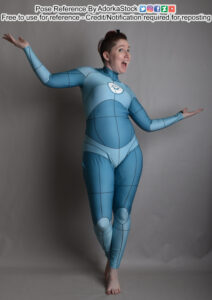 thin, white, female pose reference model in grid suit standing pose with one leg behind the other, arms up in a wide open gesture and big open mouth smile
