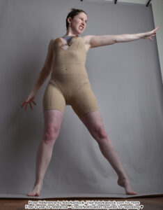 thin, white, female pose reference model in low perspective pose with one hand outstretched to the side as if casting a spell