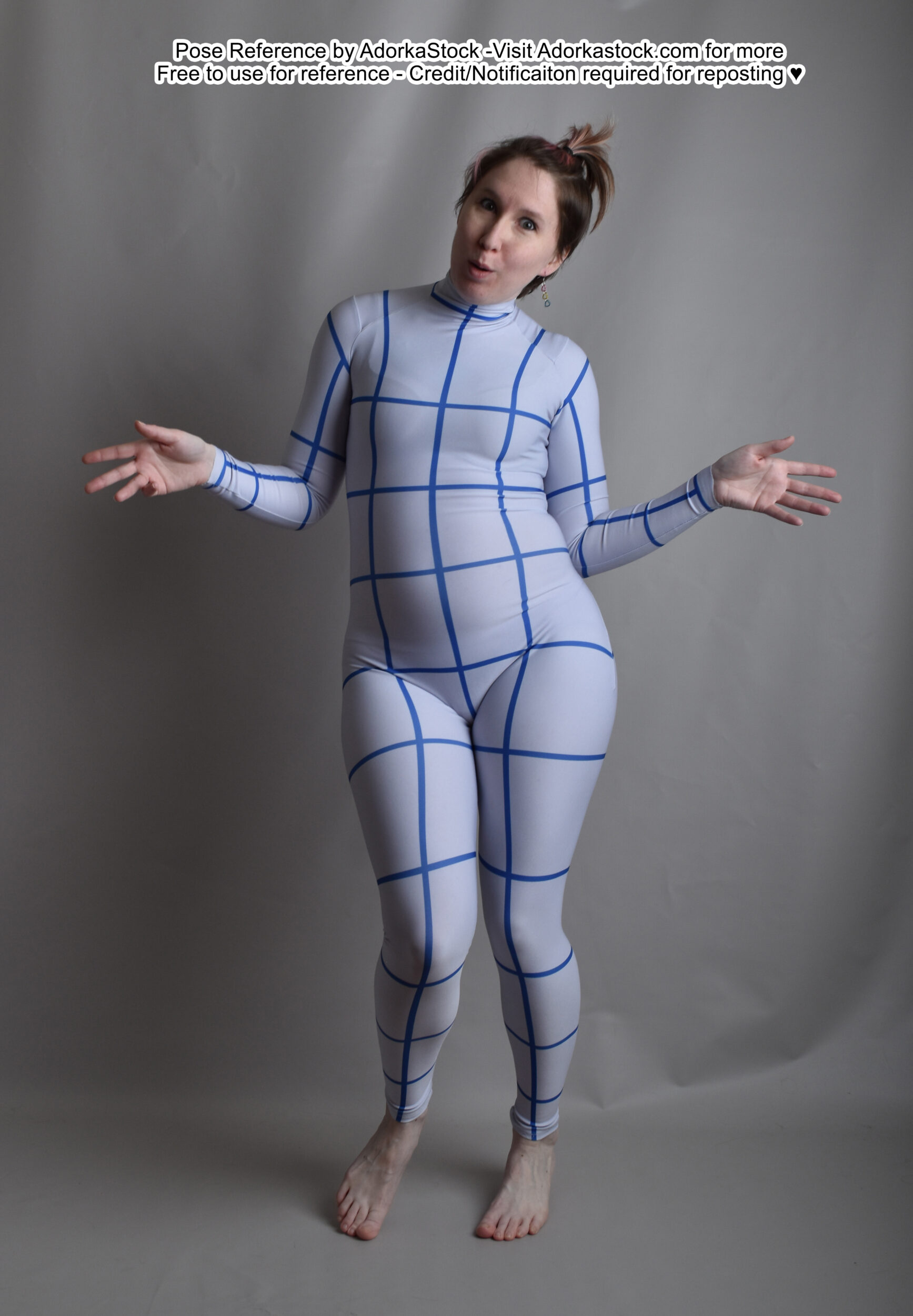 thin, white, female pose reference model in grid suit pose reference with arms out in a open hand shrug with weight shifted a bit onto one foot