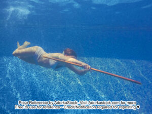 pose reference model underwater with a staff