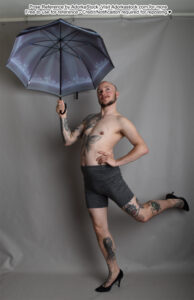 thin white male pose reference in high heels doing a little skip while holding an umbrella