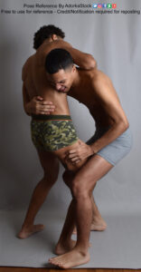 two Latino models in a bit of a physical scuffle