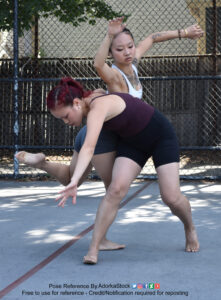 two dancing models in dynamic interlocking poses