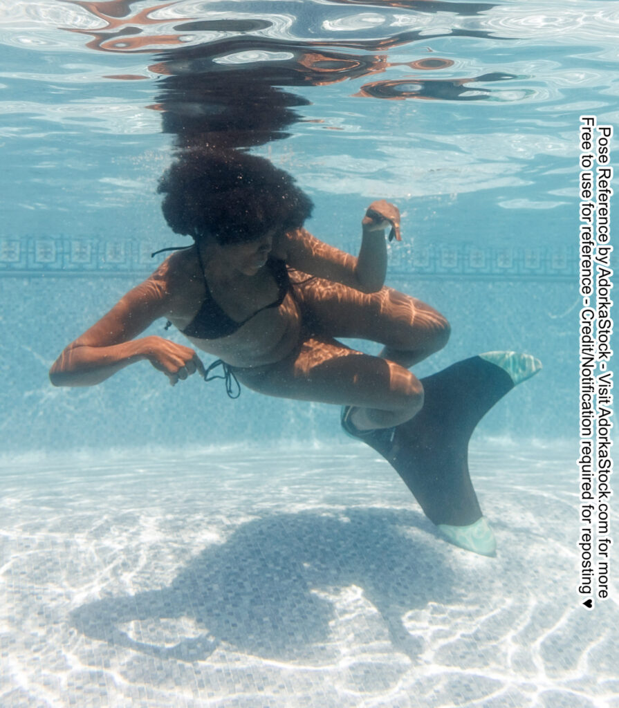 SunnyRay underwater with a monofin