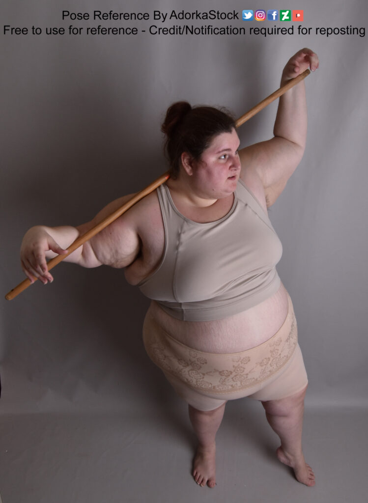 Lauren Ashley from above, staff over shoulders