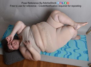 fate white female body lying on the floor seen from above, she has one ankle crossed on the other knee one hand by her face, and the other by her chest