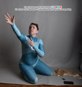 a pose reference of a kneeling thin white female model in grid anatomy suit reaching dramatically to the upper left. THere's also a sleeping kitten on the floor beside her